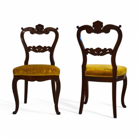 Sei sedie in mogano intagliato