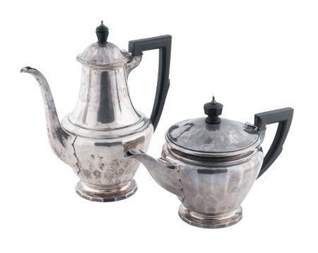 Gorham Manufacturing Co., Caffettiera e teiera in argento con manico e presa in ebano. Birmingham, 1919.
