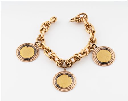 Bracciale in oro con tre sterline. 1950.