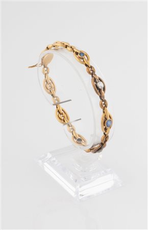 Bracciale in oro 18 kt con brillanti e zaffiri. 1950 ca.