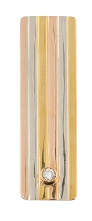 Fermasoldi in oro 18 kt tre colori con brillantino. 1960-1970.