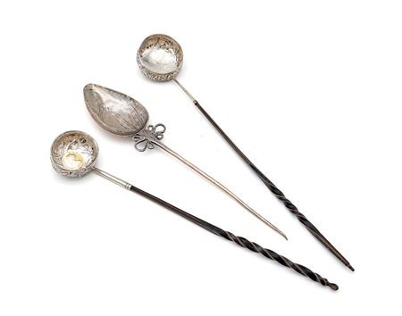 Cucchiaio da cerimonia e due mestoli in argento, XVIII secolo cucchiaio con...