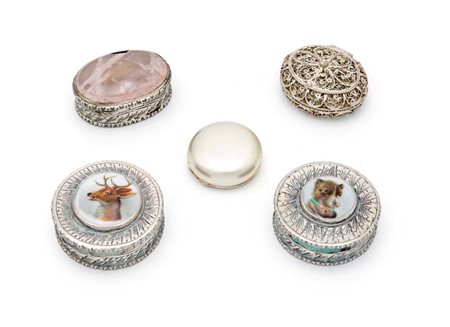 Cinque portapillole in argento diversi due di forma circolare con volute...