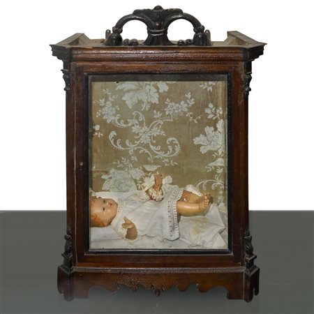 Gesù Bambino in ceroplastica contenuto in teca di legno, 19° secolo