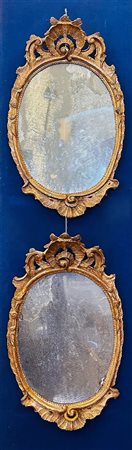  
Coppia di specchiere veneziane meta' del XVIII secolo
 cm 89x53