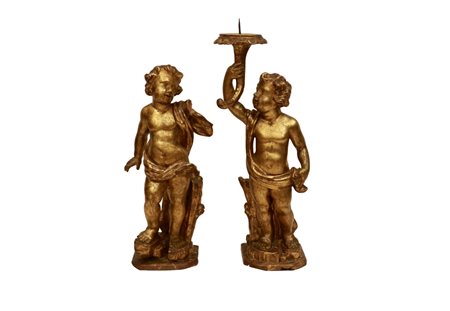  
Coppia di angeli portacero in legno dorato e intagliato XVII secolo
 altezza cm 88; altezza cm 102