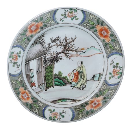 Piatto in ceramica cinese dinastia Qing , periodoo Kangxi con raffigurazione di un maestro con allievo, 17° secolo