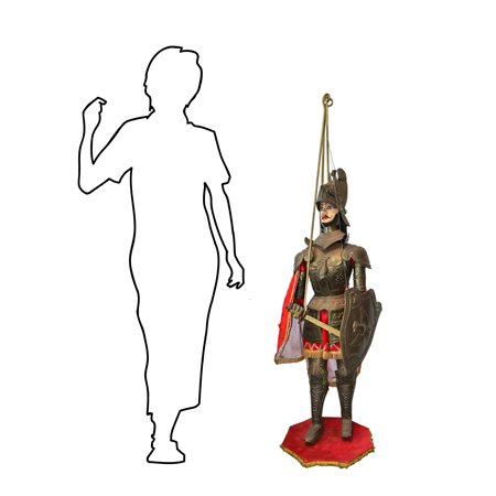 Pupo di Sicilia con armatura in metallo bronzato e vestiti e mantello rosso