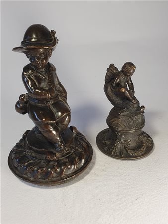 Due tappi da calamaio