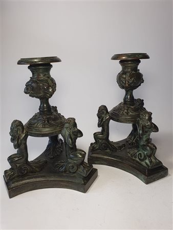 Coppia di candelieri con satiretti