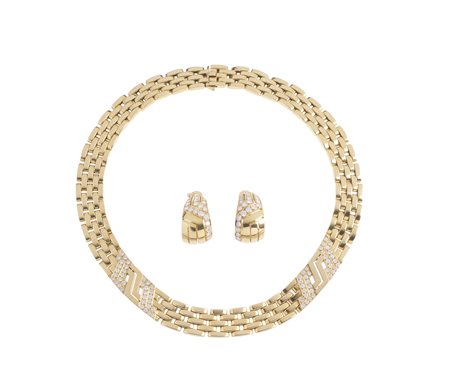 CARTIER - Parure composta da collier e orecchini Panthere in oro giallo 18k e diamanti bianchi taglio a brillante ct 5,50 circa.