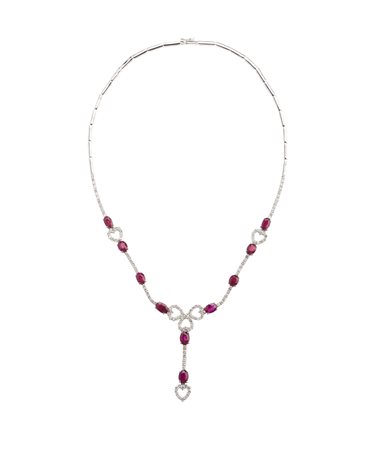  - Elegantissima collana in oro bianco 18k con segmenti snodati, diamanti e rubini .