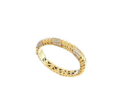  - Bracciale in oro giallo 18k con diamanti .