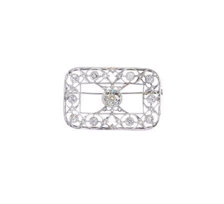  - Spilla rettangolare traforata in oro bianco 18k con diamanti .
