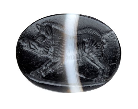A Roman late republican banded agate intaglio. Boar.