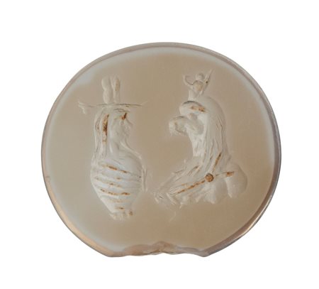 A Roman agate intaglio. Canopus vase with a bust of Horus.