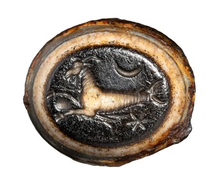 A Roman agate intaglio. Seagoat with astrological attributes.