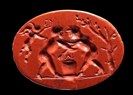 A Roman red jasper intaglio. Fight scene.