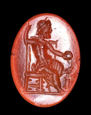 A Roman carnelian intaglio. Seated Zeus.