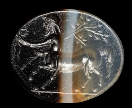 A Roman banded agate intaglio. Centaur.