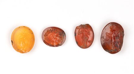 Lot of 4 Roman carnelian intaglios. Various subjects.