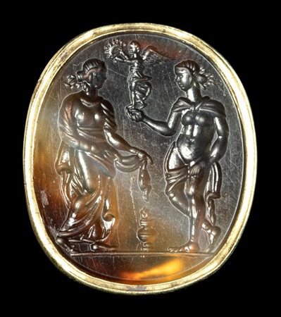 A large agate intaglio set in a gold ring. Allegorical scene.