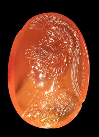 A large carnelian intaglio signed Aspasios. Bust of Athena Parthenos.