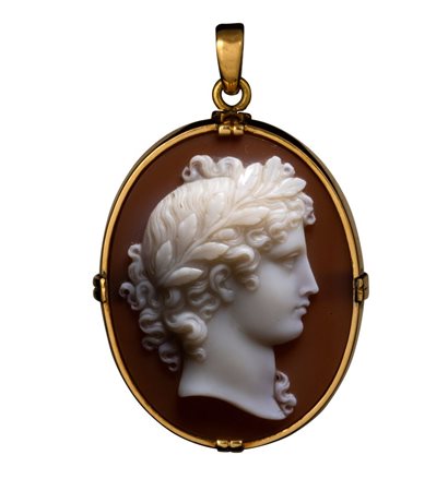 An early Victorian agate cameo set in a gold pendant. Laureated head of Apollo.
