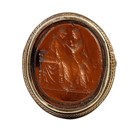 A Grand tour glass cast impression set in  a gilted siver brooch. Two figures