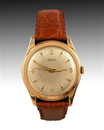 Orologio Piaget in oro rosso 18kt, cassa tonda, quadrante argentato con...