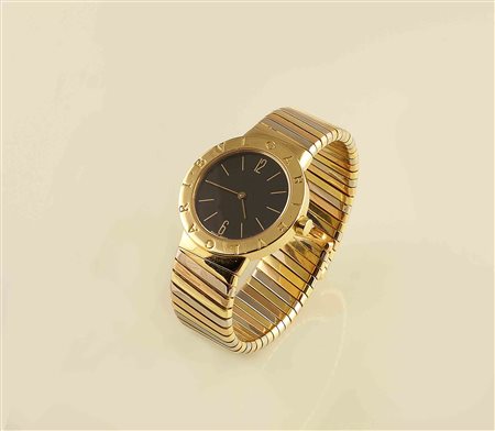 Bracciale orologio Bulgari in oro 18kt a tre colori, cassa tonda, quadrante...