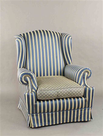 Poltrona bergere interamente imbottita e rivestita in tessuto, cm. 101x82x85.