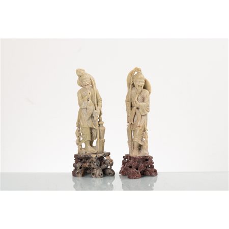 MANIFATTURA ORIENTALE DEL XX SECOLO, Coppia di sculture