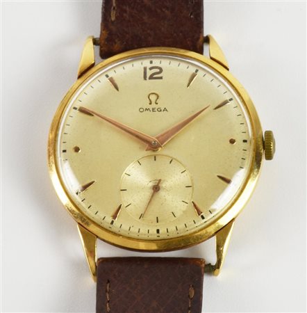 OROLOGIO IN ORO OMEGA, anni ‘70 CASSA: in oro 18K QUADRANTE: champagne con...