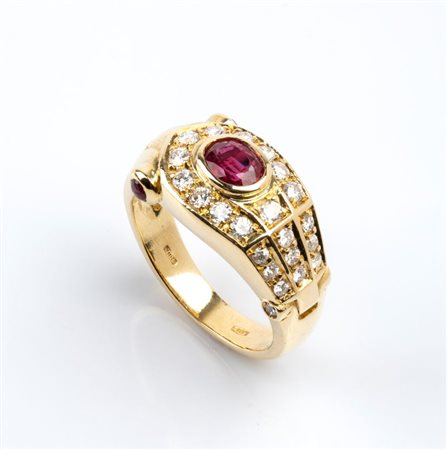  
Anello a fascia in oro con rubini e diamanti     
 