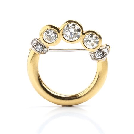  
Spilla in oro con diamanti  
 