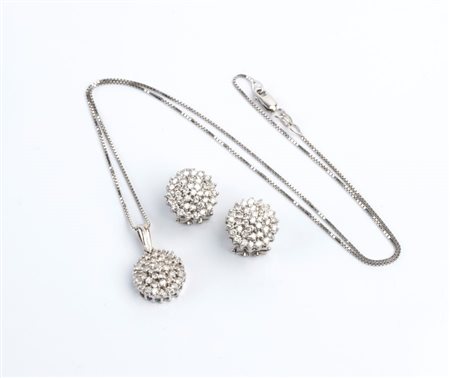  
Demi parure in oro e diamanti 
 