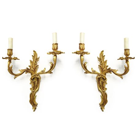 Coppia di appliques in metallo dorato dorato