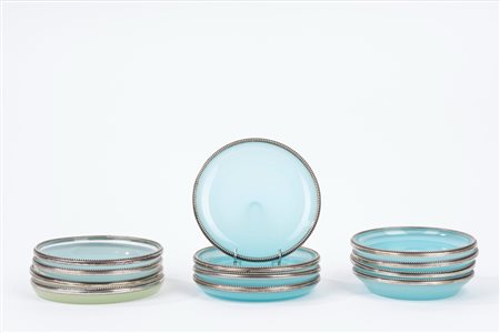 Dodici piattini in opalina con bordo in argento, secolo XX