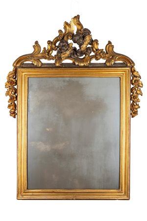 Specchiera in legno intagliato e dorato, secolo XIX