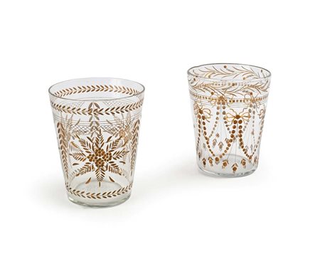 () Due rinfrescatoi simili in vetro con decorazione molata e dorata, inizi XX...