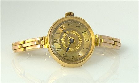 ANONIMO OROLOGIO DA POLSO DA DONNA DEL 1900 CA.Cassa in oro giallo 18 kt con...