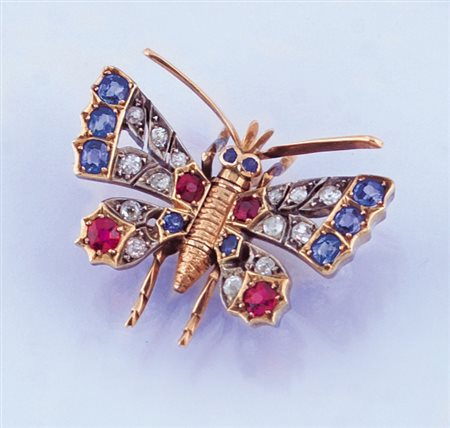 SPILLA SPILLA ANNI '50 CA. In oro rosa ed argento raffigurante farfalla con...