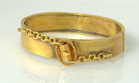 BRACCIALE BRACCIALE XIX. In oro giallo 18 kt montatura rigida con motivo a...