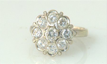 ANELLO ANELLO. In oro bianco 18 kt a fiore con diamanti taglio brillante per...