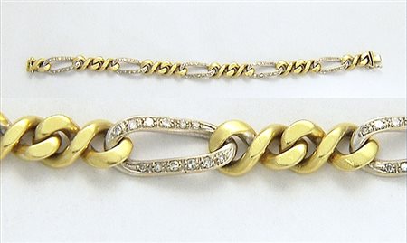BRACCIALE BRACCIALE. In oro giallo e bianco 18 kt maglia groumette alternata...