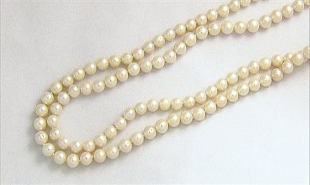 COLLANA COLLANA. Ad un lungo filo di perle coltivate Cina di mm 10/11 ca.Gr...