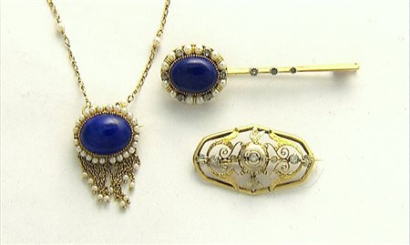 GIOIELLI VARI LOTTO DI DUE GIOIELLI. In oro giallo 18 kt ed argento composto...