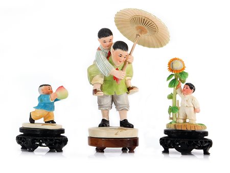AVORIO TRE GRUPPI IN AVORIO, CINA, XX SECOLO, raffiguranti bambini al gioco,...