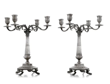 ARGENTI RECENTI COPPIA DI CANDELABRI IN ARGENTO, ANNI '70, in stile Impero a...